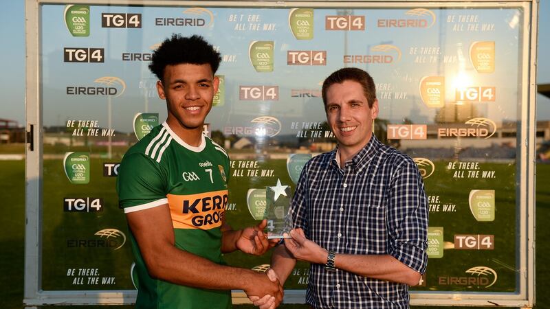 Kerry’s Stefan Okunbor is presented with his man of the match award. Photograph: Piaras Ó Mídheach/Sportsfile