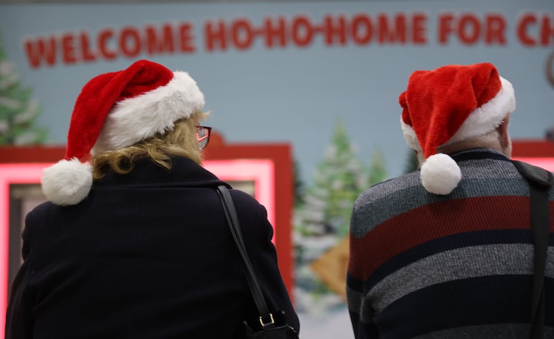 Dermot and Mary Groarke await the arrival of their daughter Emma from Washington DC at Dublin Airport. Photograph: Bryan O’Brien/The Irish Times

