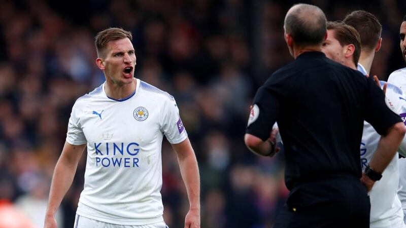 Marc Albrighton reacts after being sent off by Mike Dean. Photograph: Eddie Keogh/Reuters