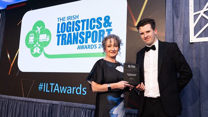 Maura O'Toole, owner/principal trainer of Facilitrain presents the own account transport operator of the year to Richard Lunn, BWG Foods