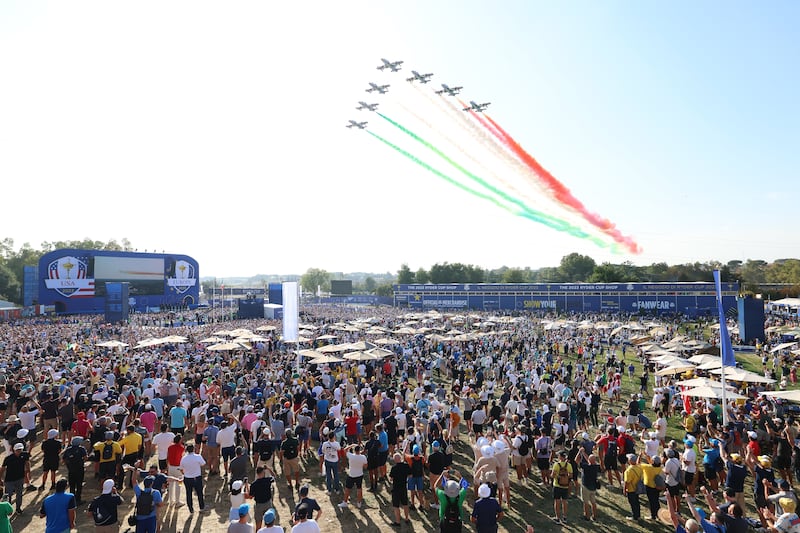 The Frecce Tricolori (Tricolour Arrows) perform a display over the crowd during the opening ceremony for the 2023 Ryder Cup at Marco Simone Golf Club in Rome. Photograph: Tom Dulat/Getty Images