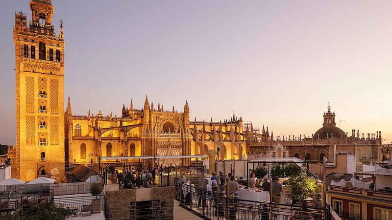 In Seville, Sheila happened upon a chic rooftop bar in the EME Catedral Hotel. 'Sitting there, I had about seven different stories I could have set in that rooftop bar,' she says.