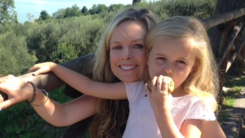 Julia Kelly with her daughter, Ruby Mae. ‘Driving her to school, I tried to save time by putting my face on in the car, my child leaning forward in her seat to tell me when the lights had changed from red to green’