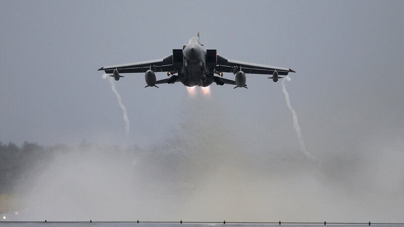 A file image of a  Royal Air Force Tornado takes off from RAF Lossiemouth in Scotland. The House of Commons is debating a motion to extending the bombing campaign against Islamic State to Syria. Photograph: Reuters