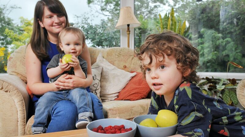 Ciara Norton with her children, Oran (14 months) and Rian (3), in Kanturk, Co Cork. Photograph:  Daragh Mc Sweeney/Provision