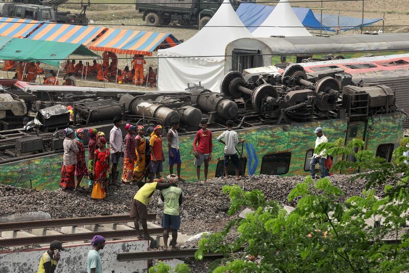 Indian railway ground workers install new railway tracks at the site of a train accident at Odisha Balasore, on Sunday. Photograph: Piyal Adhikary/EPA