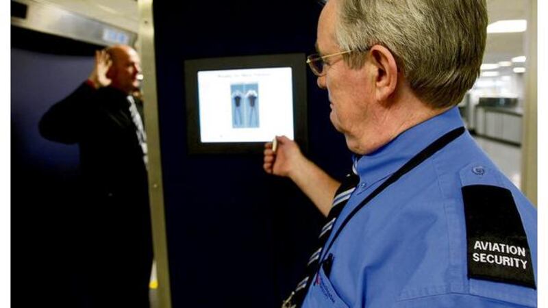 Double take: full body scans may help to identify passengers carrying weapons (such as the man carrying a knife, right), but at Israels Ben-Gurion International Airport, above, it is the human factor that makes it one of the safest airports in the world. Photographs: Phil Noble, Ronen Zvulun/Reuters