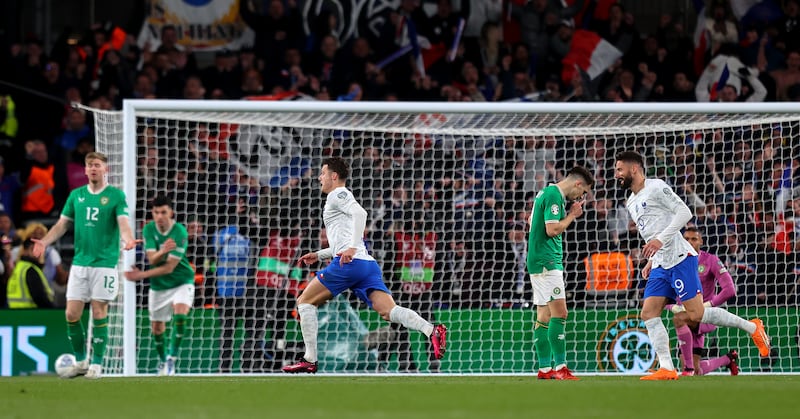 France celebrate their winner, scored after Ireland had given the ball away. Photograph: Ryan Byrne/Inpho