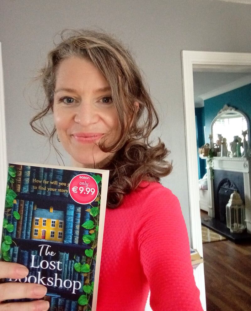 Evie Gaughan with a copy of her fourth novel, The Lost Bookshop