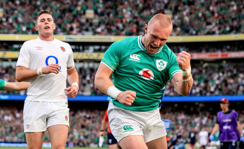 Ireland’s Keith Earls celebrates after scoring a try whilst making his 100th appearance for Ireland. Photograph: Dan Sheridan/Inpho