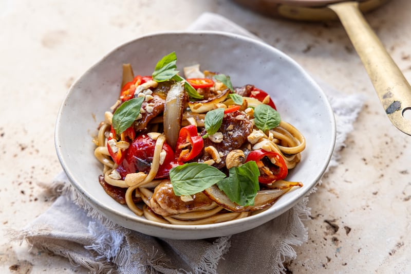 Thai-style fried pork steak noodles with chilli, basil and cashew nuts. Photograph: Harry Weir