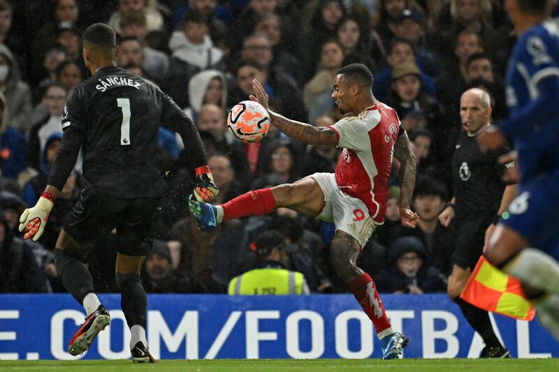 Arsenal's Gabriel Jesus crossing the ball as Chelsea goalkeeper Robert Sanchez comes out to block during the  Premier League match at Stamford Bridge. Photograph: Justin Tallis/AFP via Getty Images