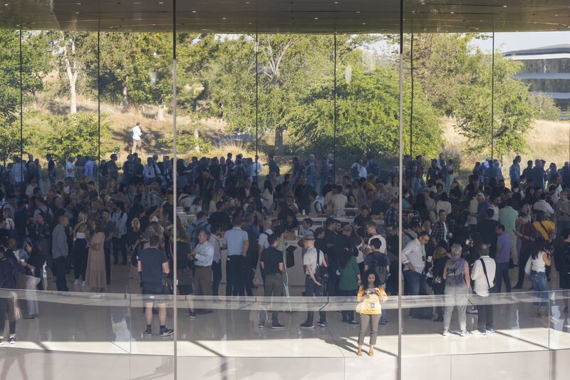 Attendees arrive at the Steve Jobs Theater for the presentation dubbed 'Far Out', where Apple unveiled the iPhone 14 line, a fresh slate of smartwatches and new AirPods. Photographer: Nic Coury/Bloomberg