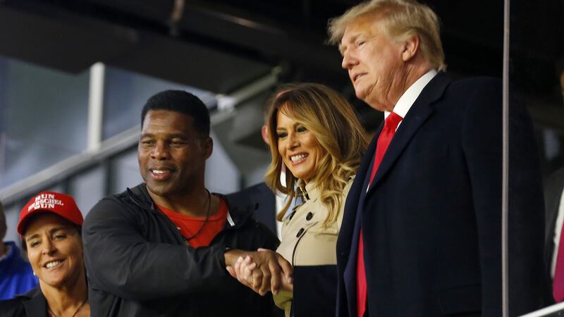 Walker with Trump and his wife Melania at the MLB World Series last year. Photo: Michael Zarrilli/Getty Images