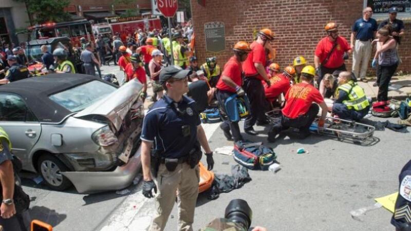 The scene in Charlottesville, Virginia after a car ploughed into a crowd of anti-racism protesters on Saturday, killing one person and injuring several others. Photograph: Paul J Richards/AFP/Getty Images