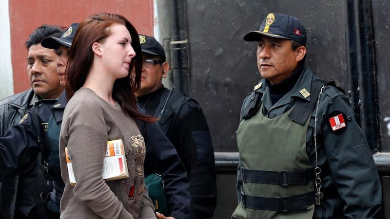 Michaella McCollum Connolly is escorted from a truck to court at Sarita Colonia prison in Callao. Photograph: Mariana Bazo/Reuters