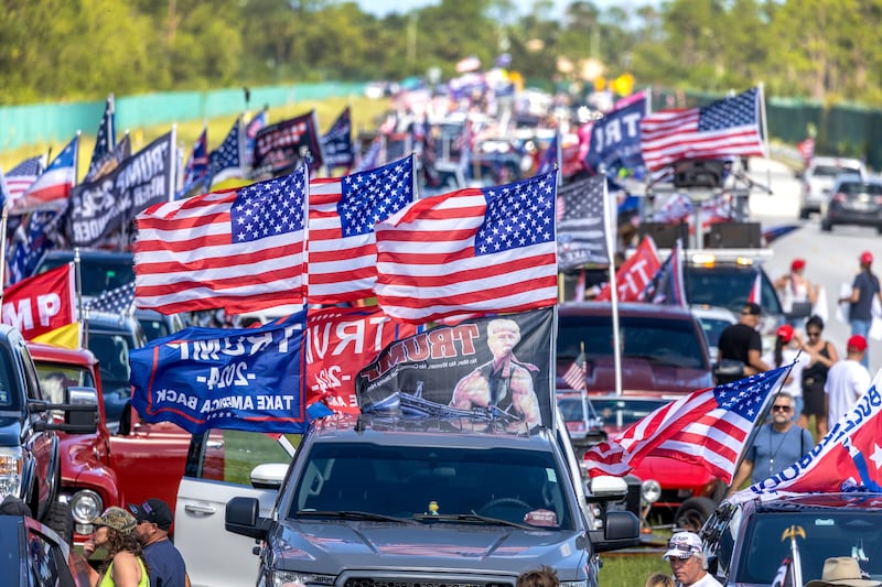 Supporters of Donald Trump attend the 'Trump Parade' in West Palm Beach, Florida on Sunday. Photograph: Cristobal Herrera-Ulashkevich