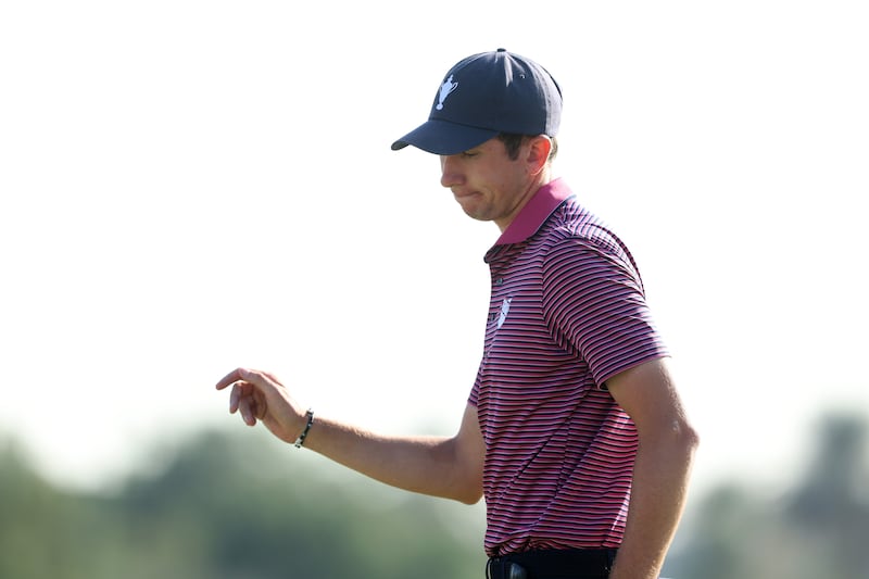 Tom McKibbin of Team Great Britain & Ireland on the 18th green on day three of the Team Cup at Abu Dhabi Golf Resort. Photograph: Kate McShane/Getty Images