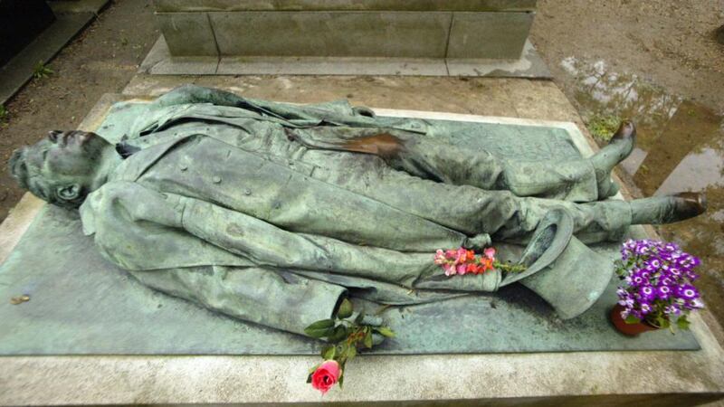 Grave of French journalist Victor Noir at Père Lachaise Cemetery in Paris. Photograph: Joel Saget/AFP/Getty Images