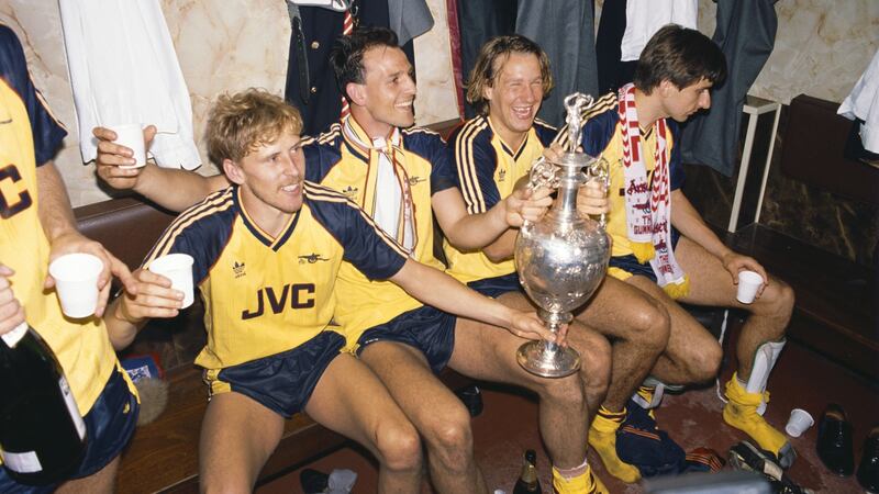 Arsenal celebrate their league title win at Anfield in 1989. Photograph: Allsport/Getty