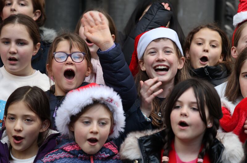 Carol singers from the Kildare Place School in Dublin at the launch of the Black Santa fundraiser at St Ann's Church on Dawson Street. Photograph: Nick Bradshaw