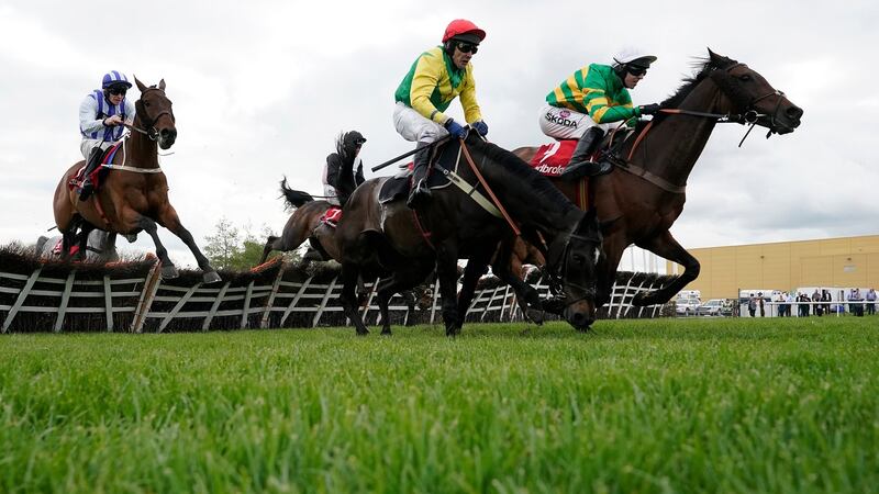 Mark Walsh riding Unowhatimeanharry (right) clears the last to win The Ladbrokes Champion Stayers Hurdle at Punchestown. Photo: Alan Crowhurst/Getty Images