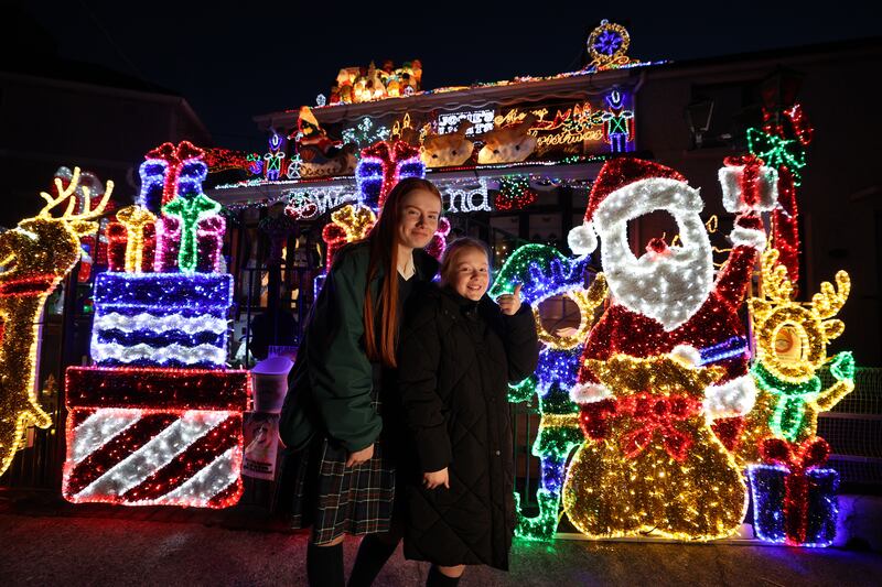 Emily (15) and Olivia (9) Geoghegan from Greenhills, Dublin, at Josie's Christmas Lights in Crumlin. Photograph: Nick Bradshaw 