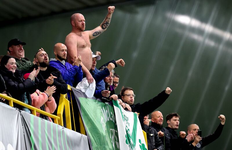 Shamrock Rovers fans celebrate after the comfortable victory over Larne in the Europa Conference League clash at Windsor Park. Photograph: Ryan Byrne/Inpho 