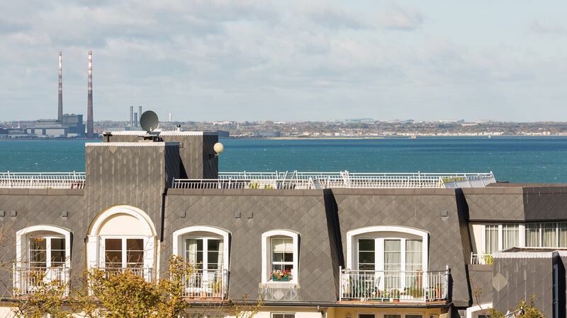 Over the rooftops across the road to sea