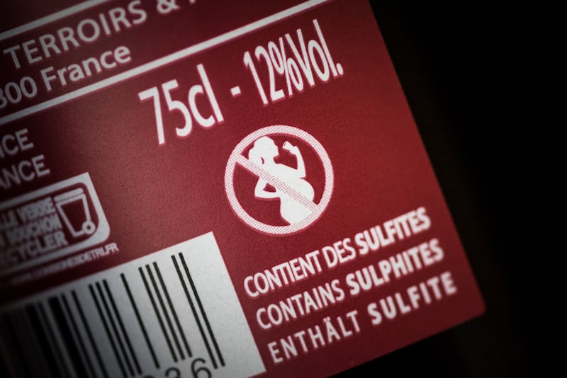 A warning against drinking during pregnancy on a bottle of French wine. Photograph: Philippe Lopez/Getty