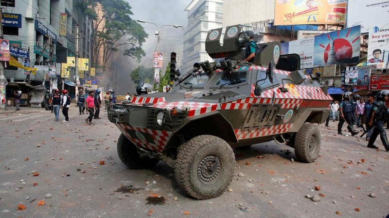 An armed police vehicle is seen during  clashes between activists of Hefajat-e Islam and the police in front of the national mosque in Dhaka  last night. Photograph: Andrew Biraj/Reuters