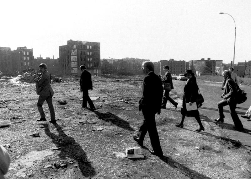 President Jimmy Carter tours the desolation around Charlotte Street in the Bronx October 5th, 1977. In a trip as symbolic as it was sudden, the president visited the South Bronx to reinforce his commitment to cities and, more specifically, to New York. Photograph: Teresa Zabala/The New York Times.