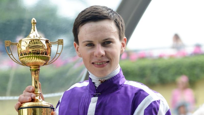 Joseph O’Brien with the Ribblesdale Stakes trophy after winning the race with Bracelet during day three of Royal Ascot in summer of 2014. Photograph: Kirstin Sinclair/Getty Images