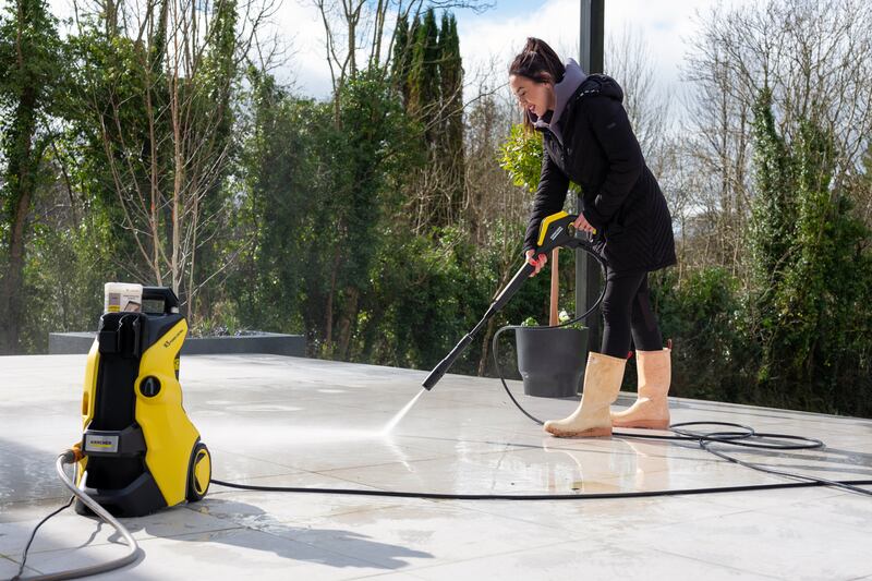 A porcelain-tiled patio area scrubs up well when you use a Kärcher pressure washer, its T5 patio cleaner and three-in-one detergent