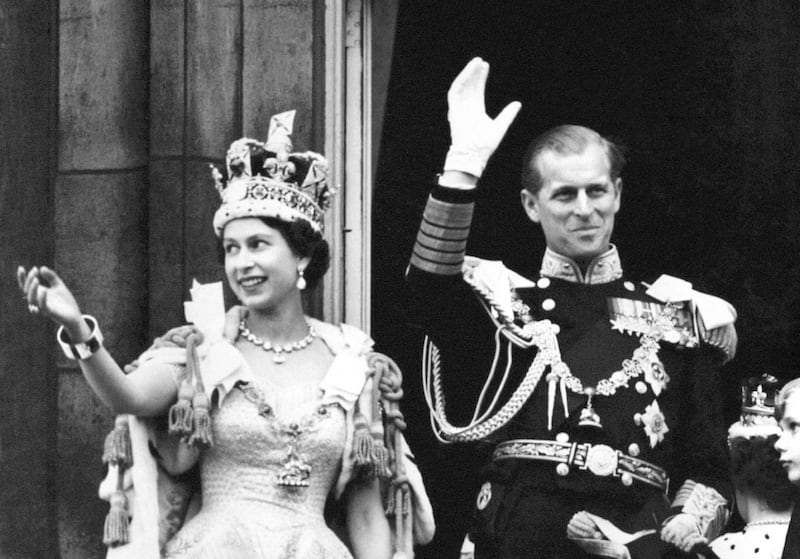 Queen Elizabeth and the Duke of Edinburgh on the balcony of Buckingham Palace after the queen's coronation in 1953 