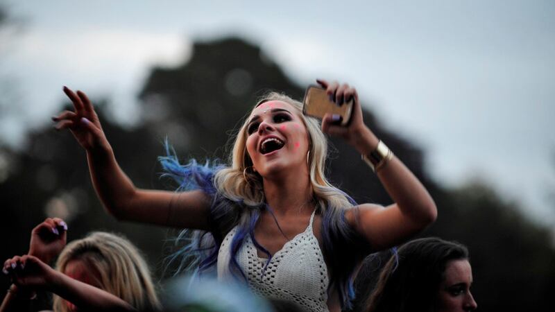 A young woman dances to The Chemical Brothers at The Longitude Festival in Marley Park. Photograph: Aidan Crawley