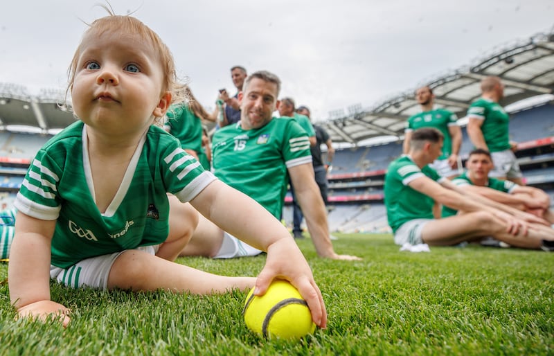 Graeme Mulcahy with his daughter Róise after Limerick's win over Kilkenny in the All-Ireland Senior Hurling final. Photograph: James Crombie/Inpho