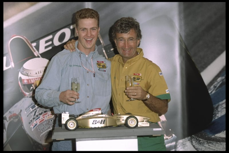 Eddie Jordan with Ralph Schumacher, brother of Michael, in September 1996 after the German signed with Jordan. Photograph: Pascal Rondeau/Allsport