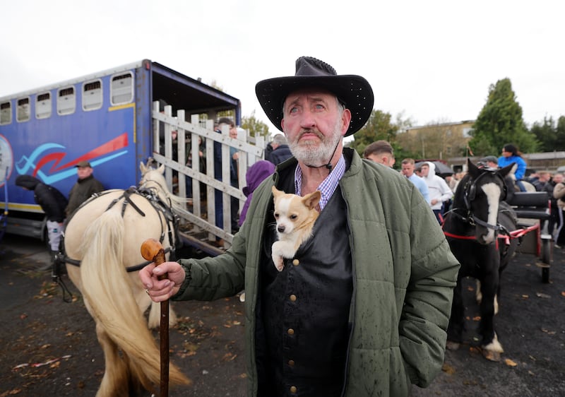 Dominick Geraghty from Meath with his dog Timmy at the 2024 Ballinasloe Horse fair. Photograph: Alan Betson / The Irish Times

