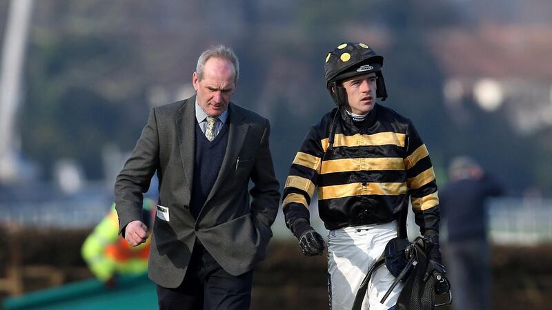 Ruby Walsh with trainer Tony Martin after he fell from at Leoprdstown last weekend. Photograph: Donall Farmer/Inphoi