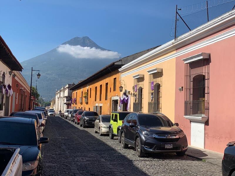 A typical Antiguan colonial street with, looming over the city, the non-active volcanic mountain of Acatenango. Photograph: Peter Murtagh