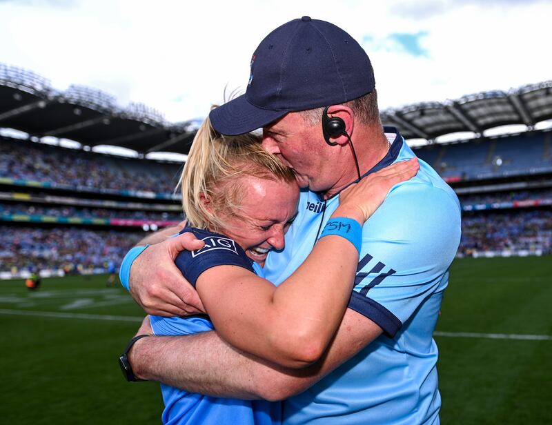 Mick Bohan celebrates with Dublin captain Carla Rowe after winning the 2023 All-Ireland final. Photograph: Piaras Ó Mídheach/Sportsfile