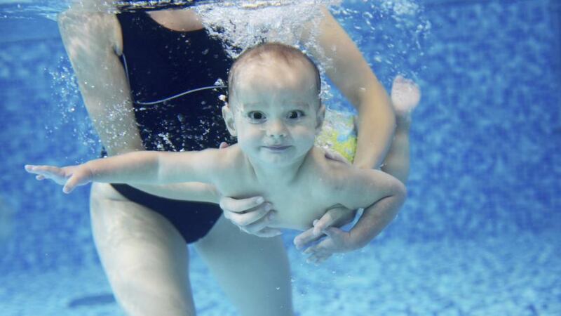 Baby swimming lessons at Sani Resort, Greece