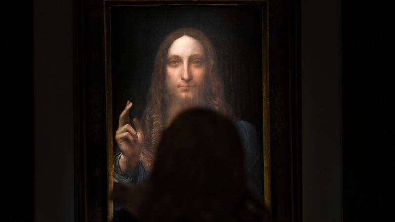 A file photo  shows Leonardo da Vinci’s Salvator Mundi on display at Christie’s New York during a press preview. Photograph: Timothy A Clary/AFP/Getty Images