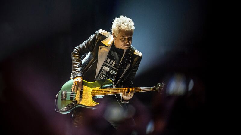 Experience + Innocence:  Adam Clayton at U2’s Tulsa show. Photograph: Shane Bevel/New York Times