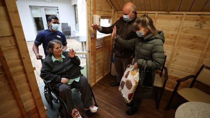 Clinical nurse manager Sijo Thomas with Orwell Private resident Bernadette Kirk, who had a visit from her brother Owen and his wife Theresa on Monday. Photograph: Nick Bradshaw