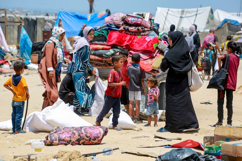 Displaced Palestinians evacuate the Mawasi area on the outskirts of southwestern Khan Younis in the southern Gaza Strip. Photograph: Bashar Taleb/AFP via Getty Images