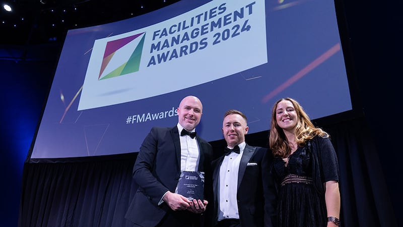 Derek O'Boyle, director of MKF Property Services, presents the FM project of the year – public sector award to Mark M Cullen and Audrey Farrell, Sensori FM