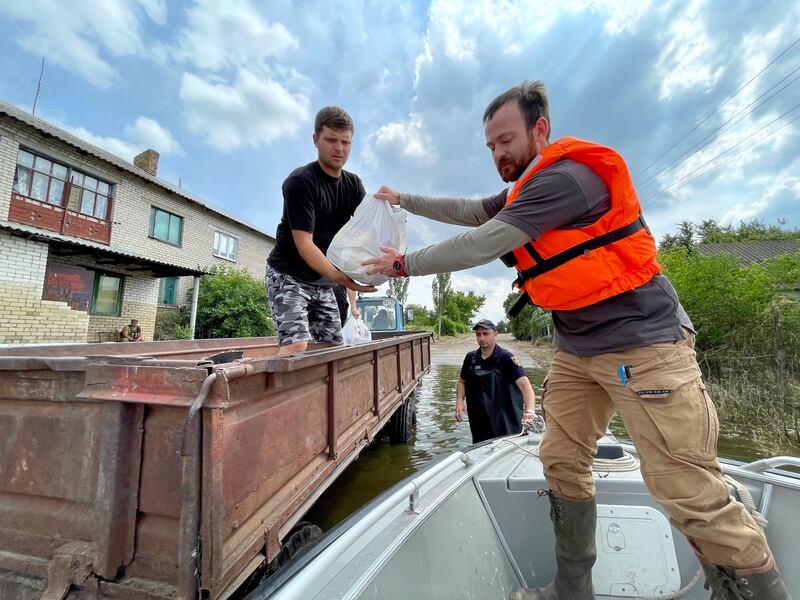 Oleh Kulakevych of Odesa-based charity New Dawn delivers food aid to the village of Novovasylivka in southeastern Ukraine after it was cut off from neighbouring areas by flooding of the Inhulets river. Photograph:  Daniel McLaughlin