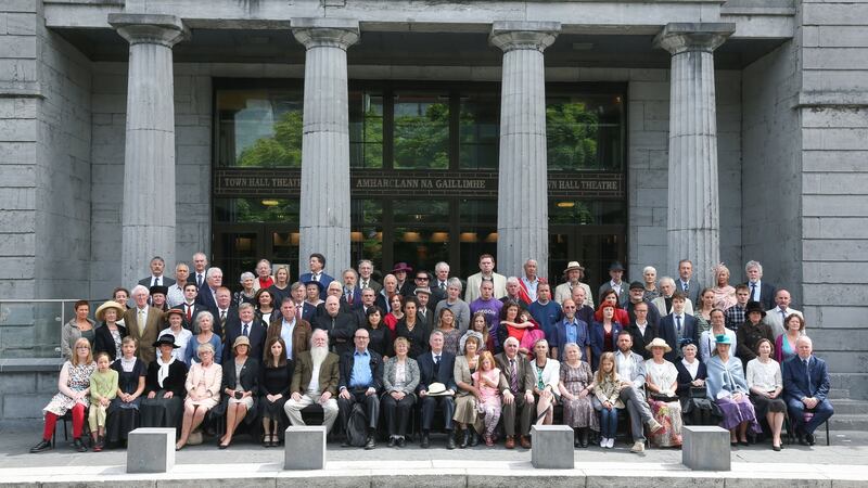 Times present: Participants, including relatives and people connected, participate in the re-enactment of the  Oireachtas 1913 group photograph outside the Town Hall Theatre in Galway. Photograph: Joe O’Shaughnessy.